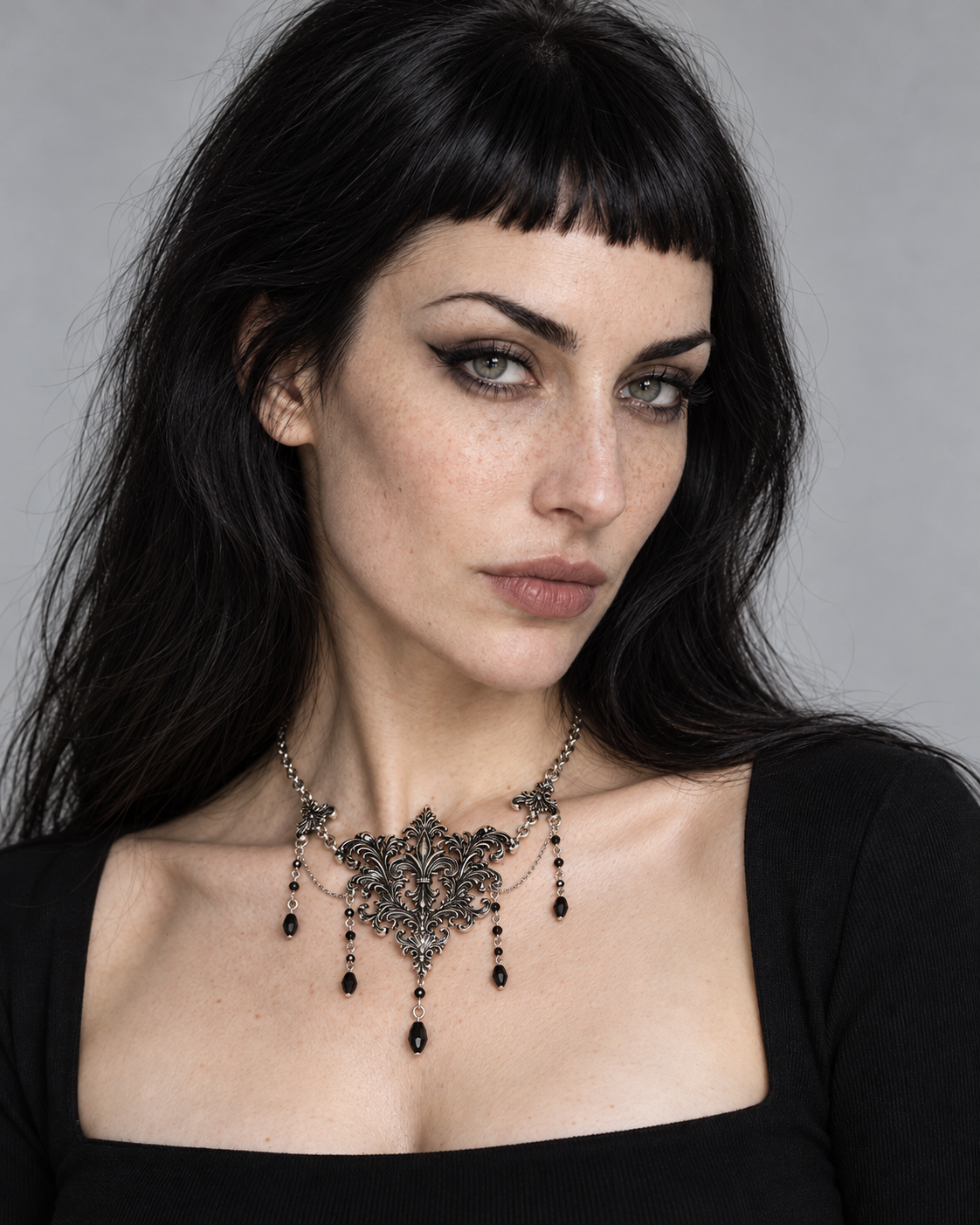 Evara Ornate Chain Drop Necklace — worn by an adult AI model