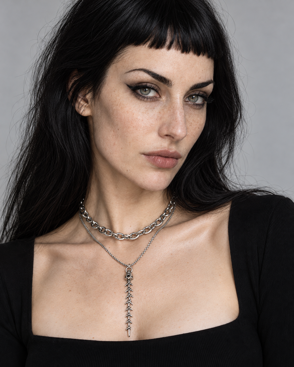 Scorthex Layered Snake Scale Necklace — worn by an adult AI model