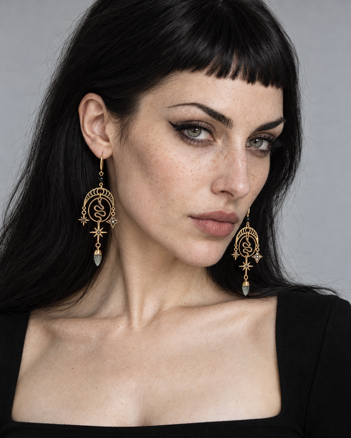Alexen Snake Moon Earrings — worn by an adult AI model