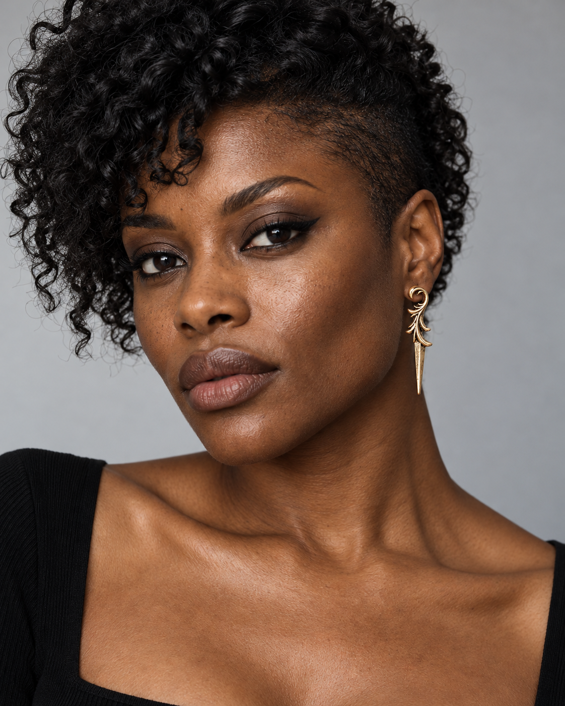 Torune Ornate Dagger Earrings — worn by an adult AI model