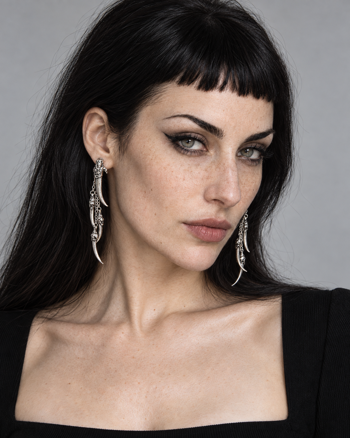 Valuma Claw Drop Earrings — worn by an adult AI model