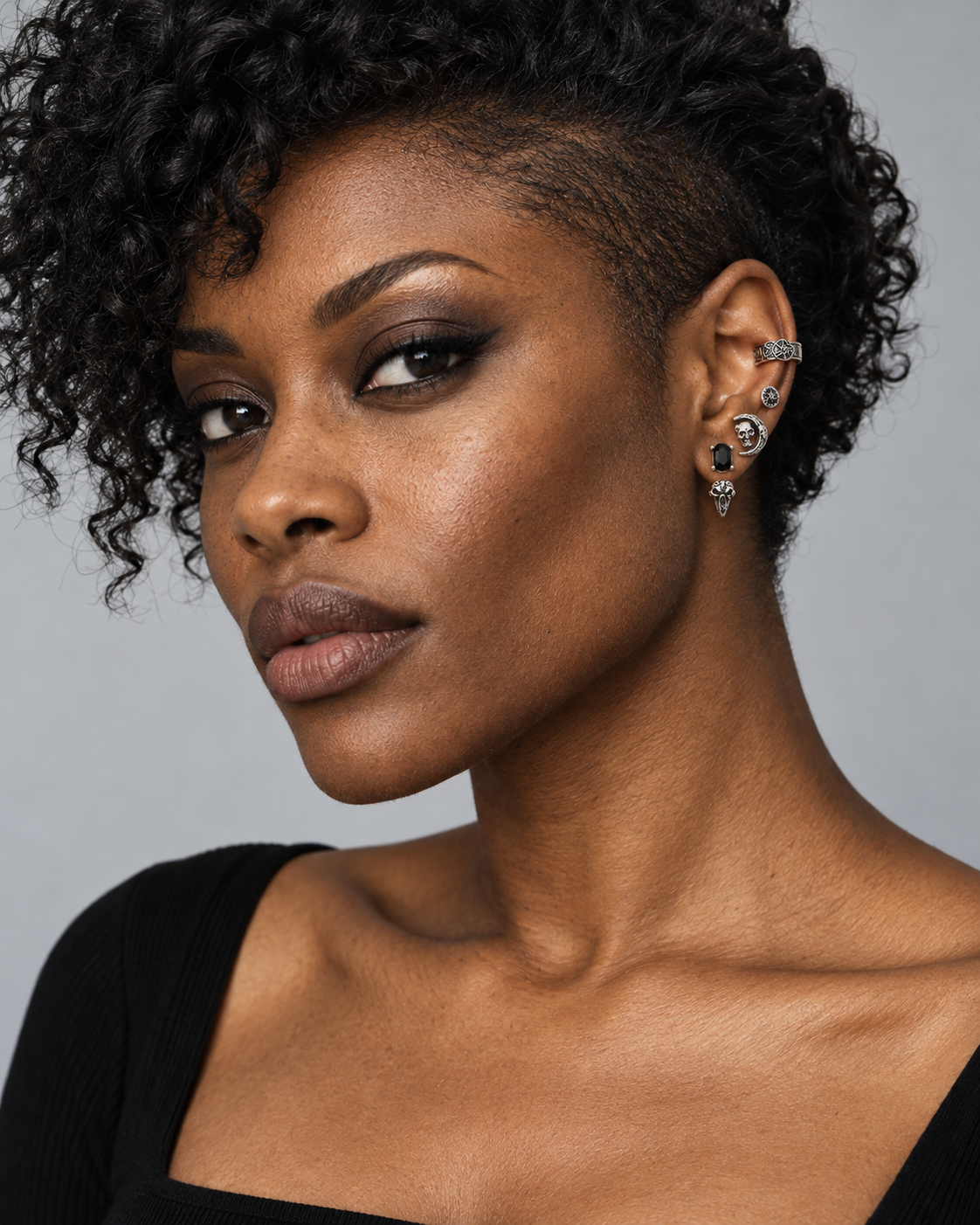 Moira Skull Stud Earrings Set — worn by an adult AI model