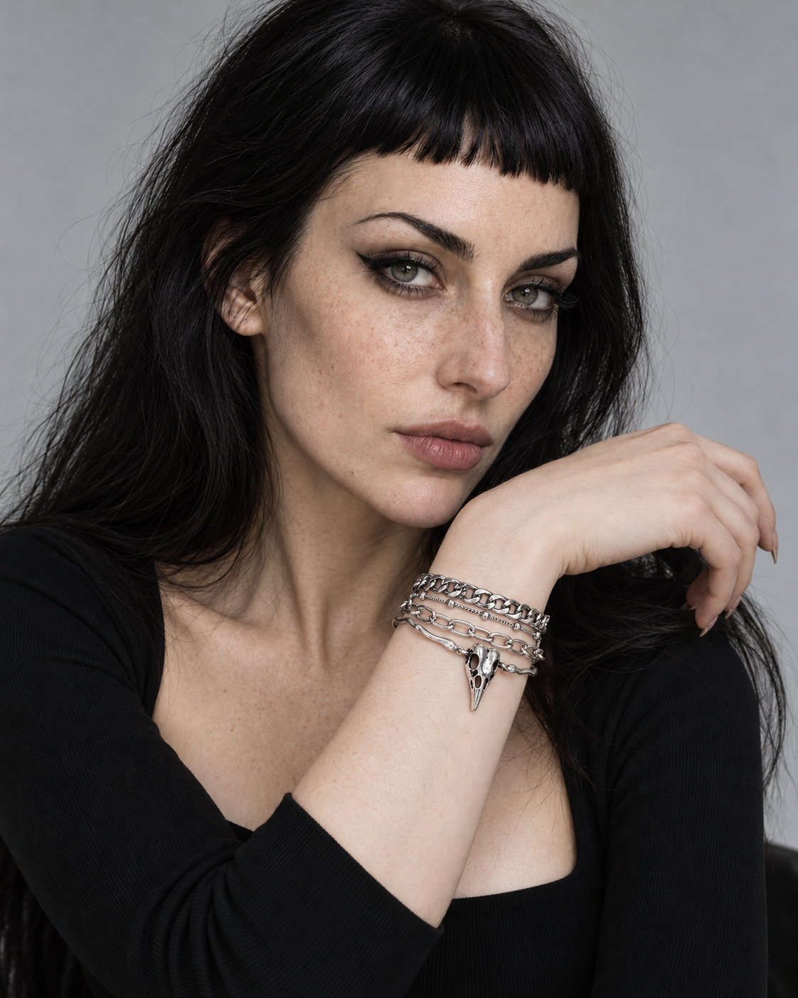 Corvus Bird Skull Bracelet Set — worn by an adult AI model