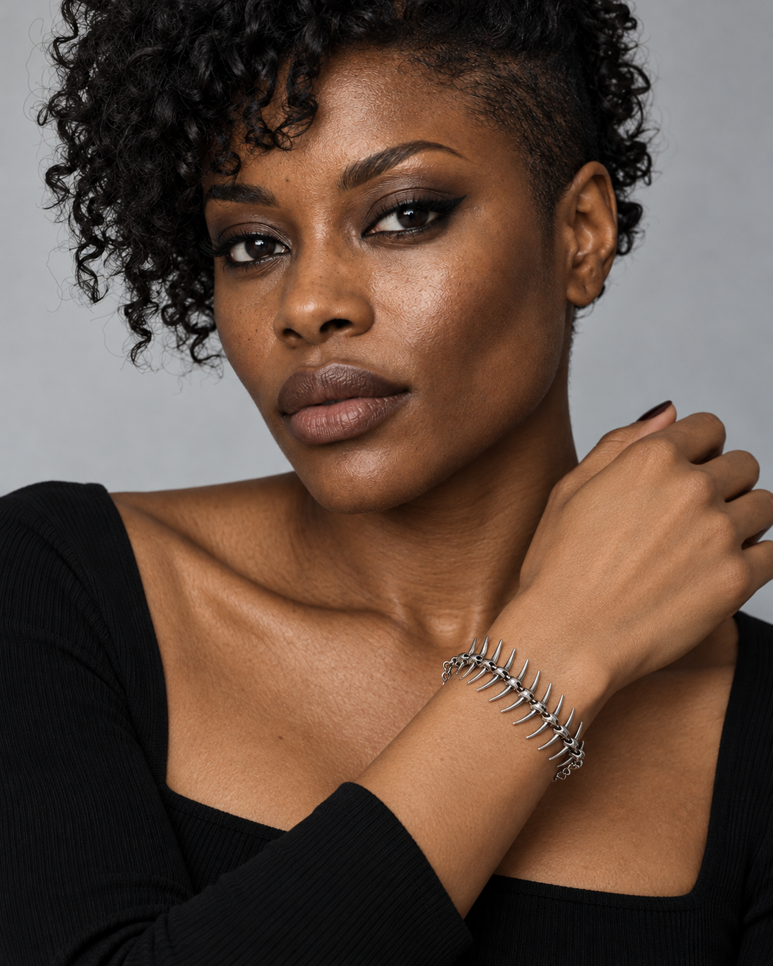 Scorthex Spine Bracelet — worn by an adult AI model