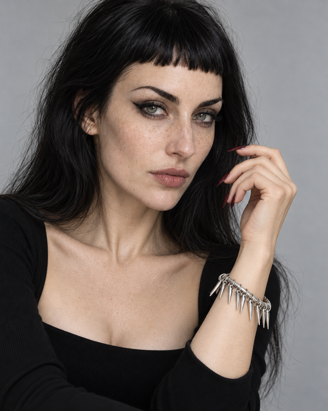 Gloryx Spike Pierced Cuff — worn by an adult AI model