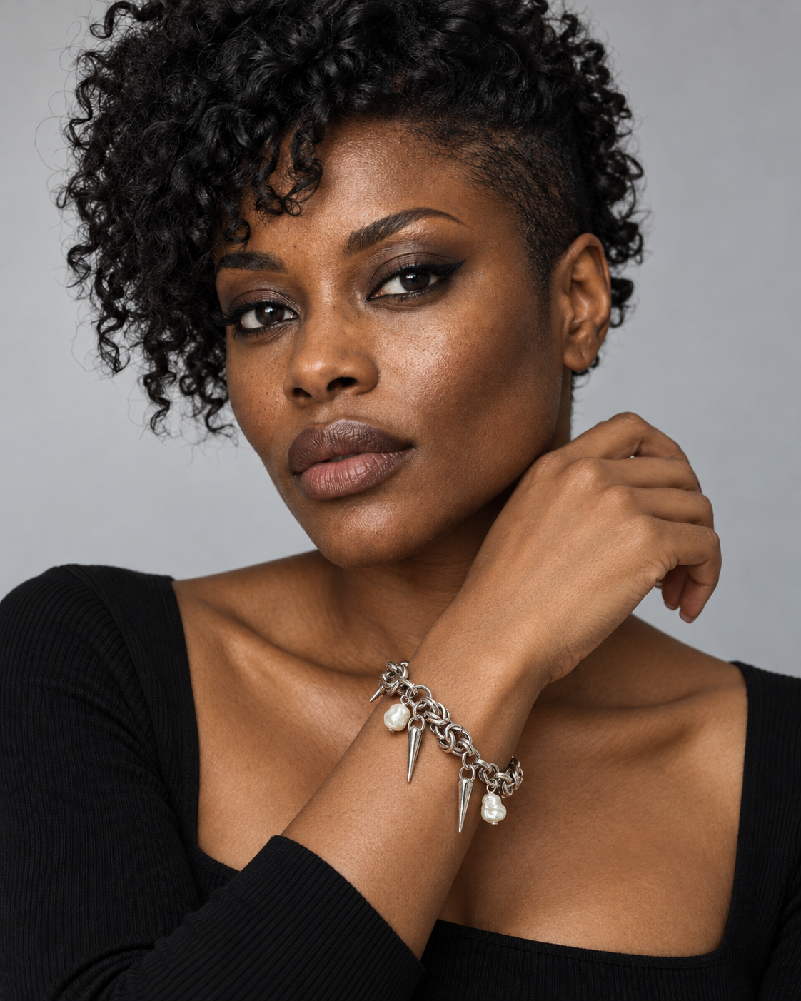 Gloryx Spike Chain Bracelet — worn by an adult AI model