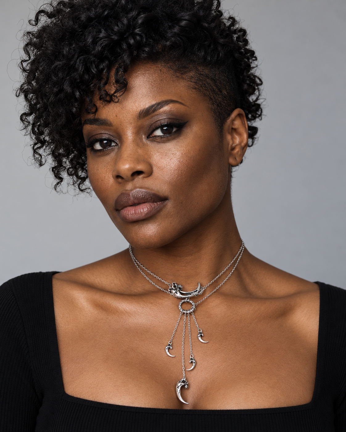 Valuma Layered Claw Necklace — worn by an adult AI model