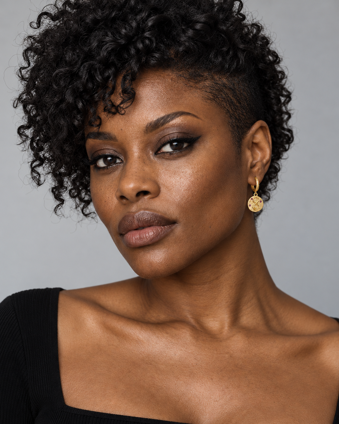 Naja Snake Charm Hoop Earrings worn by an adult Noctimoth model