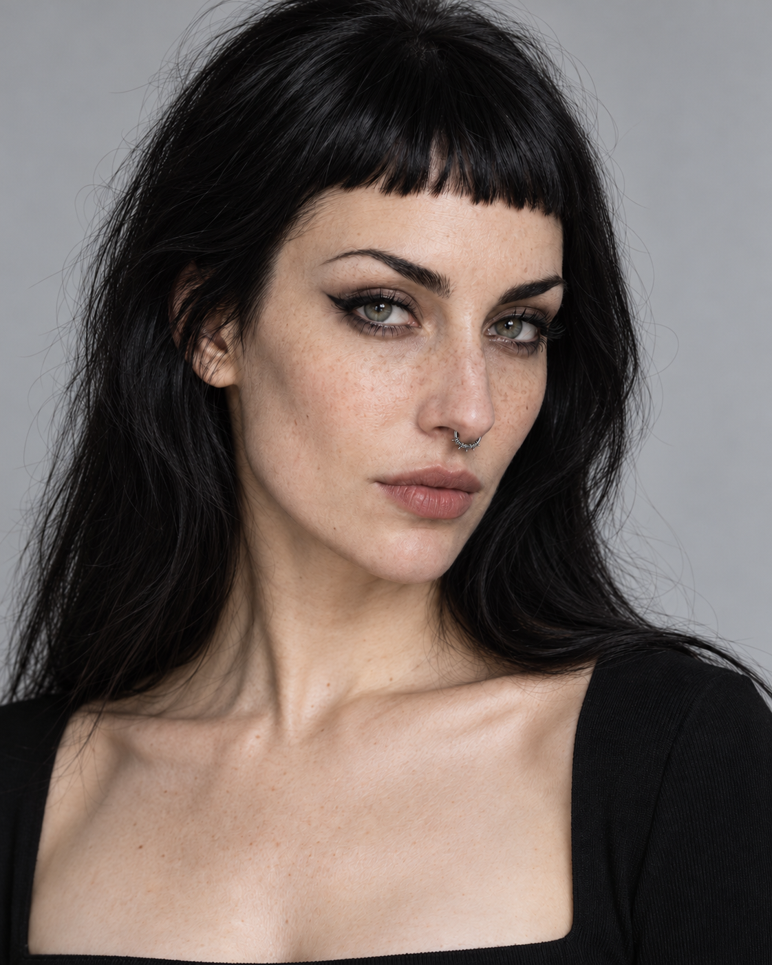 Echo Barbed Septum Piercing worn by an adult Noctimoth model